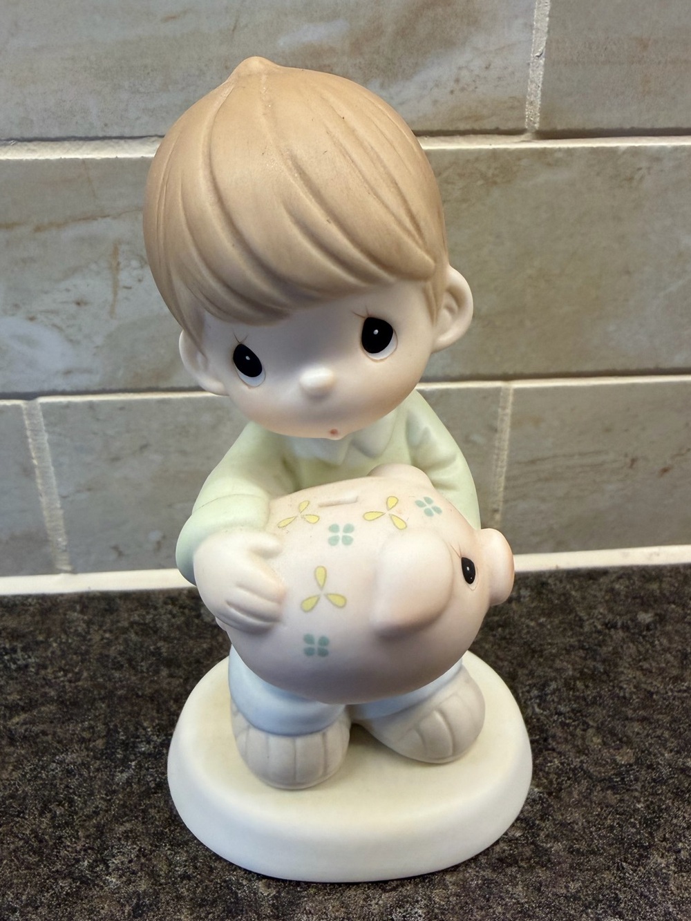 Precious Moments little boy figurine. “You can’t take it with you”, 1998